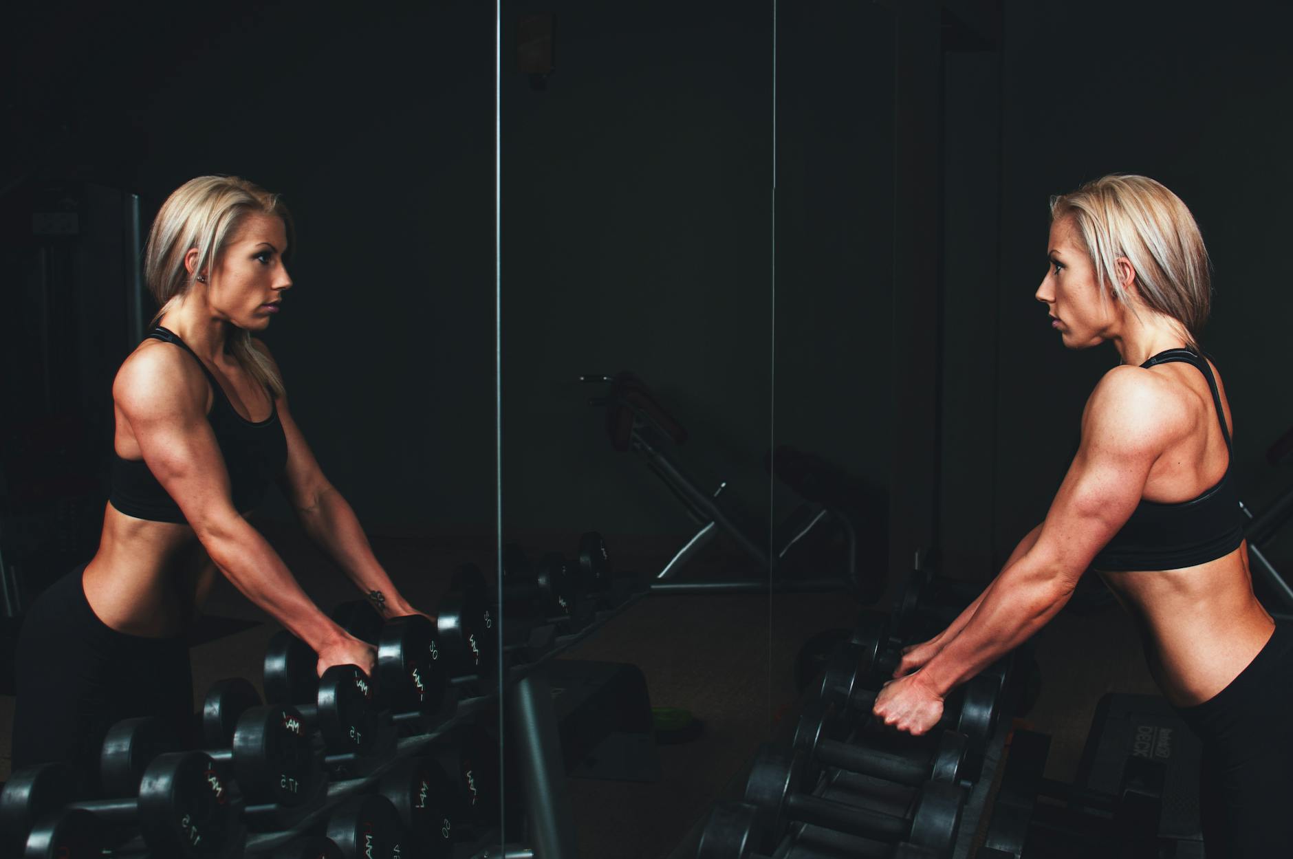 woman holding dumbbells