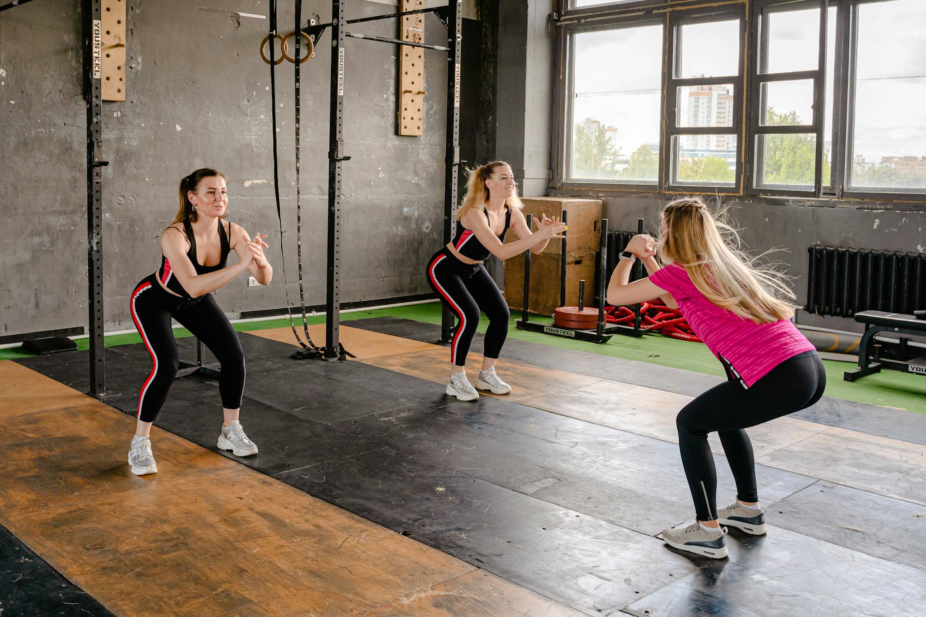 photo of women doing squats