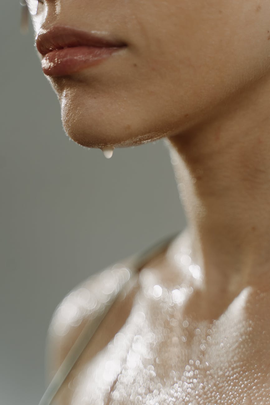 close up photo of a woman sweating