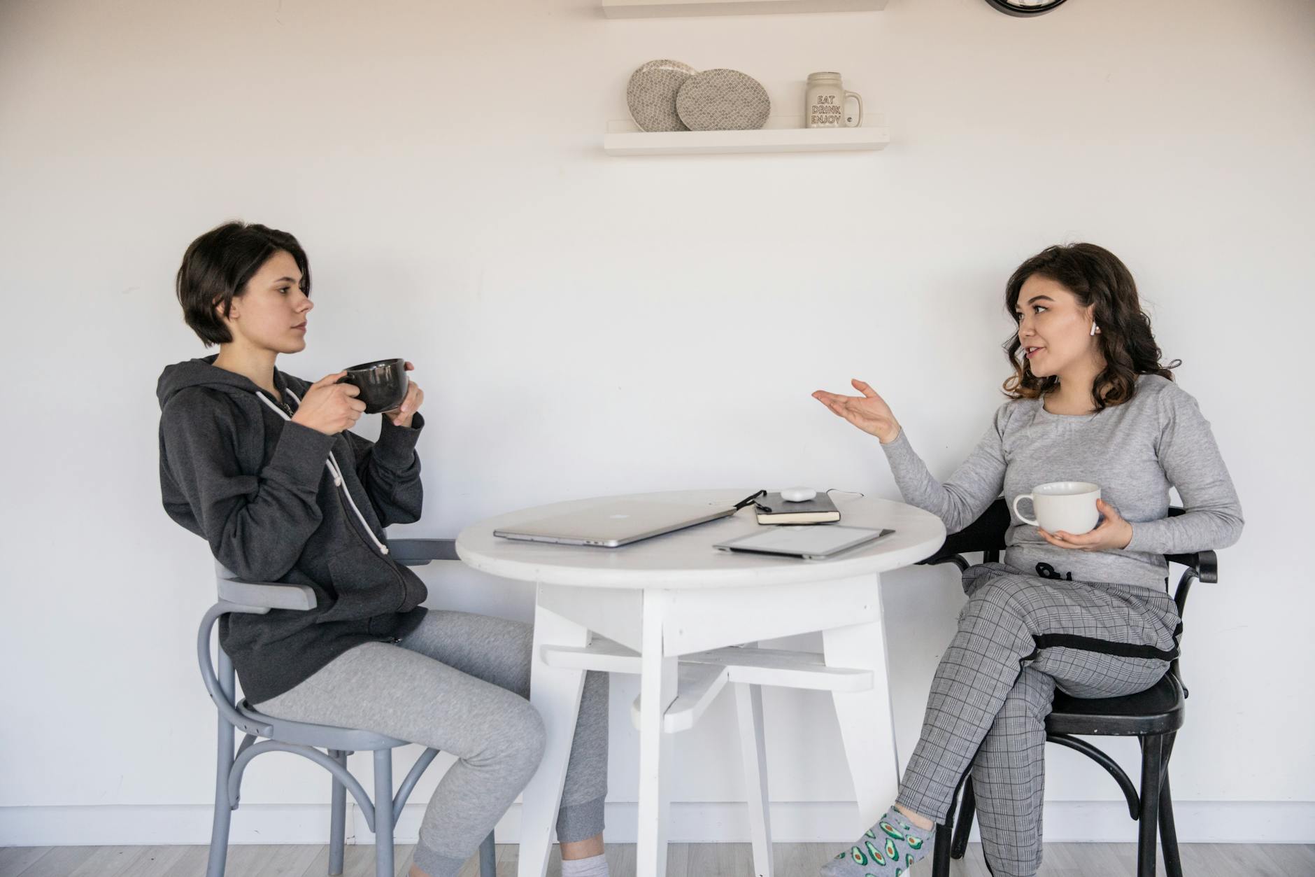 photo of women talking to each other